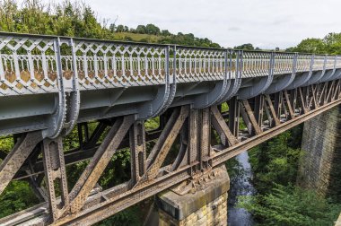 A view of a disussed bridge beside the Monsal Trail in Derbyshire, UK in summertime