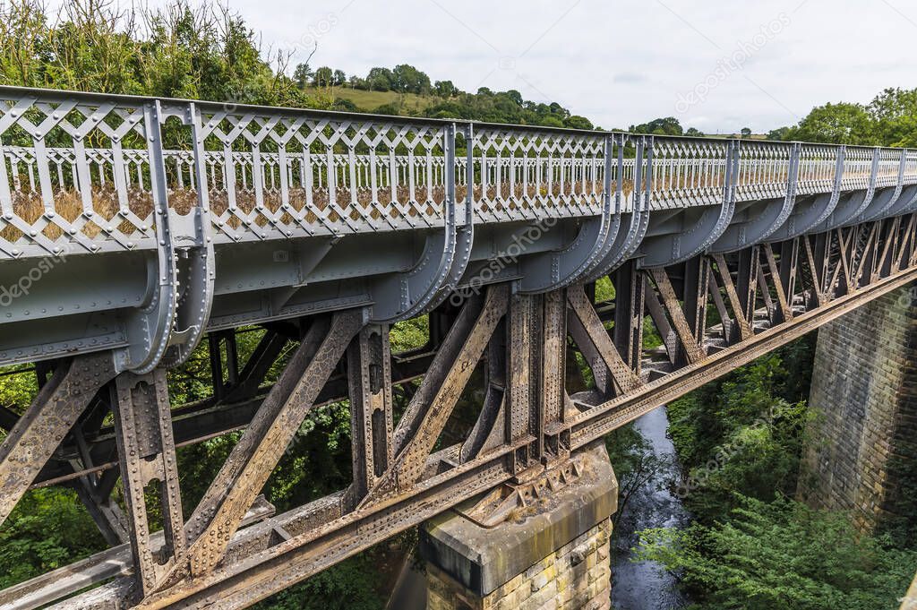 A view of a disussed bridge beside the Monsal Trail in Derbyshire, UK in summertime
