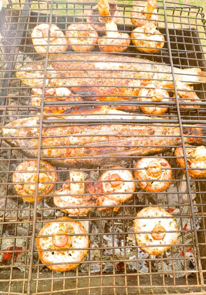 fried eggs with vegetable on the barbecue grill