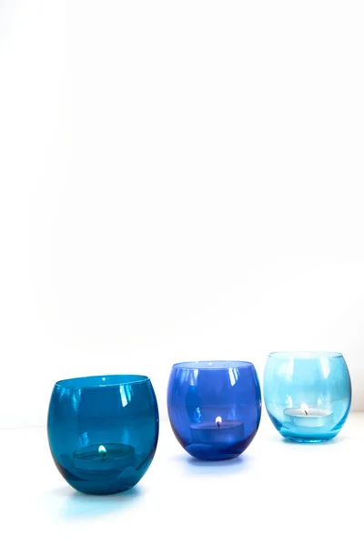 Burning Candles Dark Blue Light Blue Glass Candle Holders Decorative — Stock Photo, Image