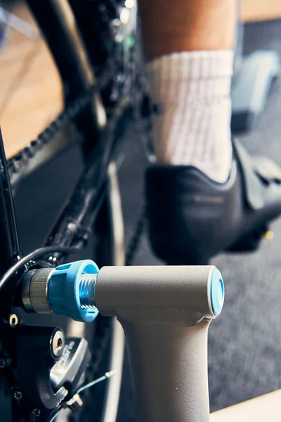 Smart trainer, Stay fit and active while at home. Indoor cycling in winter. close up.
