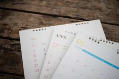 Ahşap doku planlama kavramında bulanık beyaz takvim.