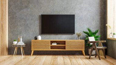 Koyu beton arka plan 33D döşemeli televizyon ve dolabı olan tavan arası boş bir oda.