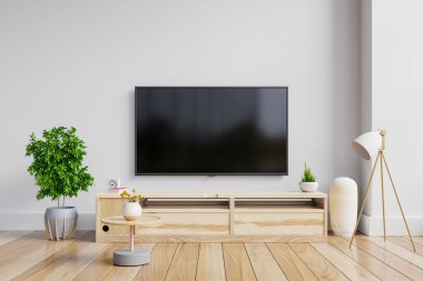 Modern oturma odasındaki dolapta LED TV beyaz arka plan 33D görüntüleme