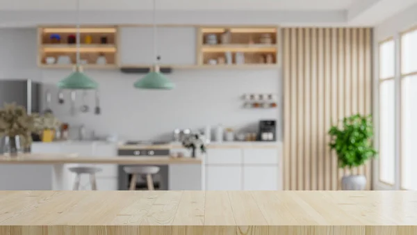 Wooden table top on blur kitchen room background,Modern kitchen room interior.3d rendering