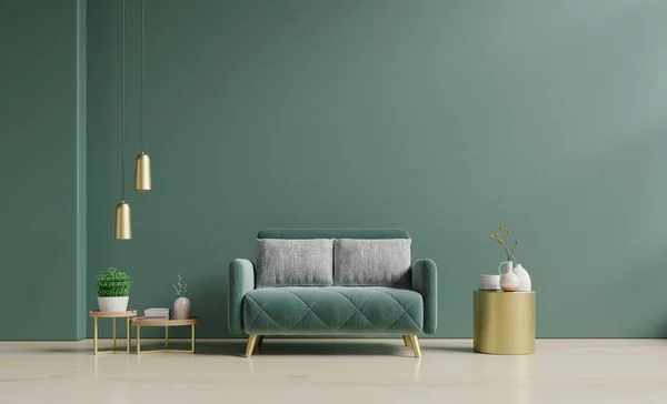 Modern minimalist interior with a green sofa on empty dark green wall.3d rendering