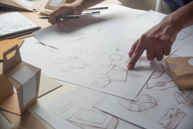 Tasarımcı çizim tasarımı Brown el işi karton kağıt ürün eko paketleme kutu geliştirme şablonu markalaşma etiketi. Tasarımcı stüdyo .