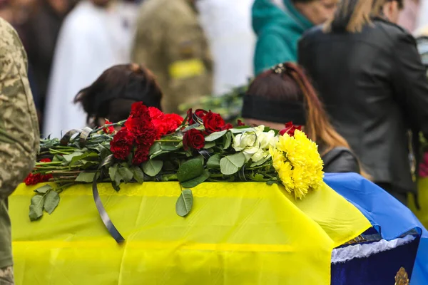 POLTAVA, UKRAINE  18 MAY, 2022: Farewell to the fallen soldier in the afternoon