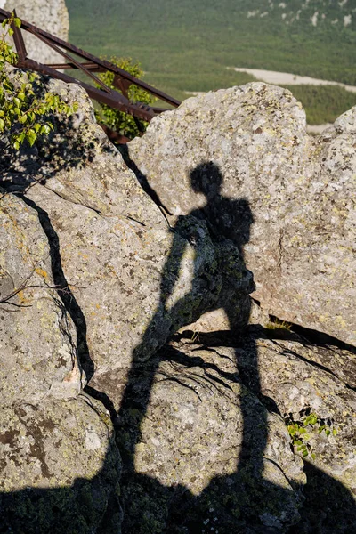 Human Shadow Visible Rock Very Sunny Day Small Green Bushes — Stock Photo, Image