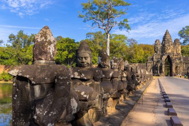 Statues at the entrance of Angkor Thom, Cambodia
