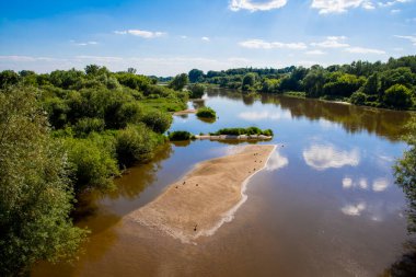 Central Europe river on a sunny summer day. Summer
