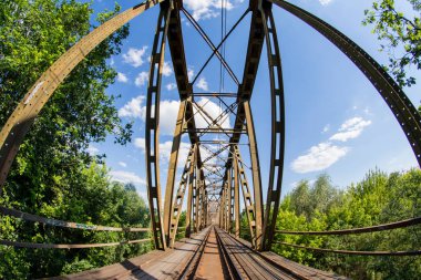 Railway viaduct in the UWA wide-angle lens on a sunny day. 