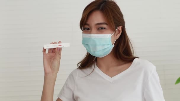 Beautiful Asian Woman Wearing Mask Tests Atk Covid Antigen Test — Stock Video