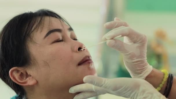 Doctor Hand Uses Antigen Test Kit Middle Aged Woman Sitting — Stock Video