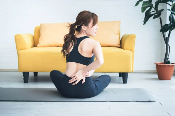 Asian Attractive Young Woman Currently Having Waist Pain Exercise Home — Stockfoto