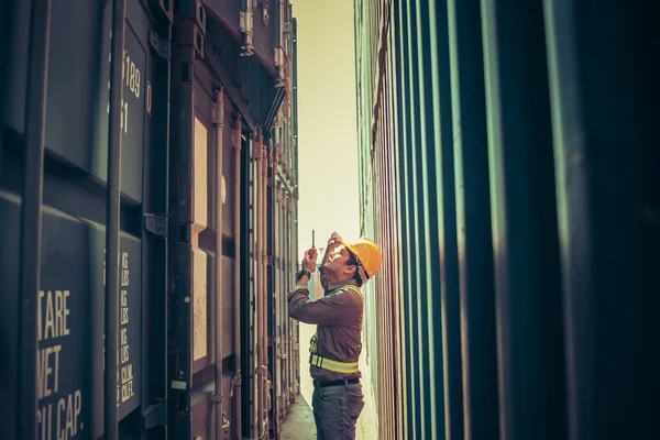 Asian Man Worker Standing Containers Using Walkie Talkie Radio Looking — стоковое фото