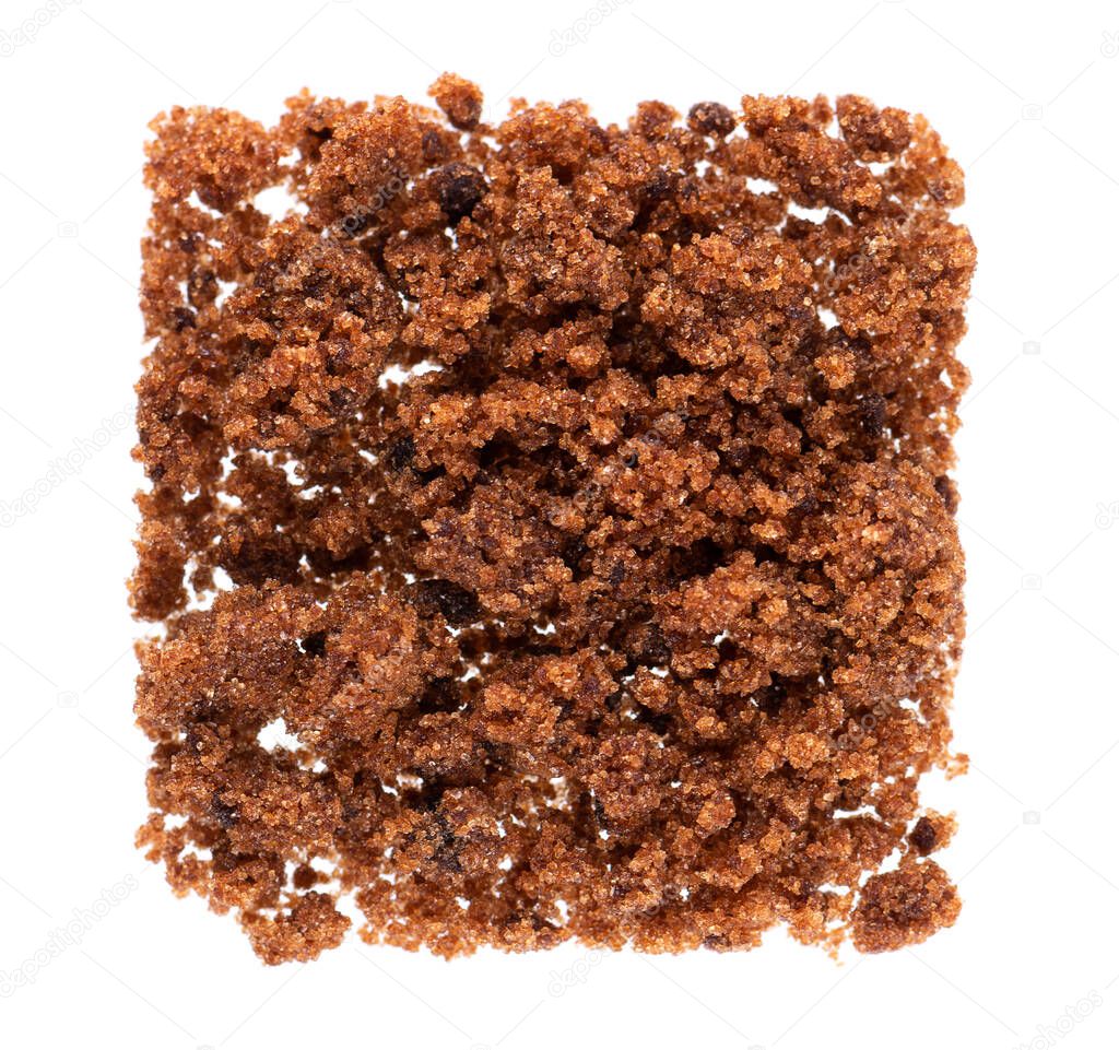 Muscovado sugar isolated on white background. Barbados sugar, khandsari or khand. Top view.