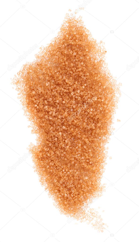 Brown sugar isolated on white background. Heap of cane sugar crystals. Top view.