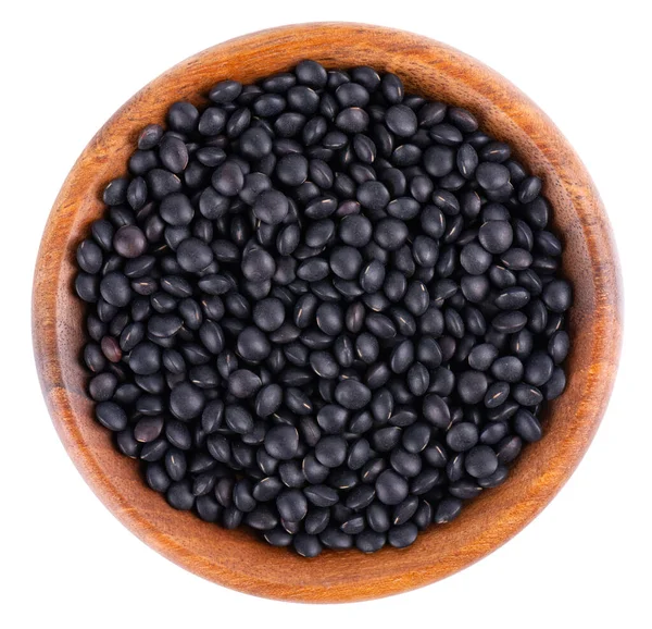 Black Lentils Wooden Bowl Isolated White Background Dry Beluga Lentil — Stock Photo, Image