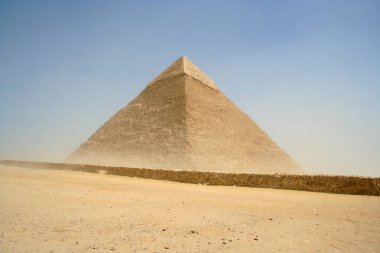 The Great Pyramid seen through a sand storm