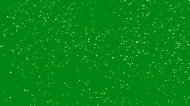 Tuşlama için yeşil ekrana nazikçe düşen kusursuz kar döngüsü.