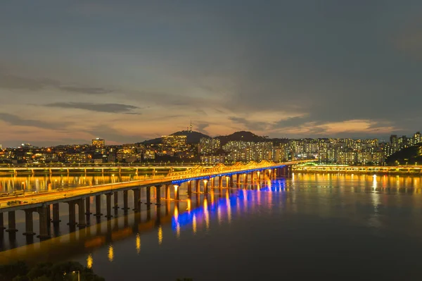 Traffic and  Sunset at.  Dongho bridge in   Han river   Seoul City,South Korea.