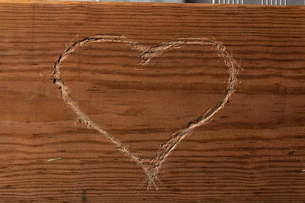 Herzform auf Holz geschnitten Stockbild