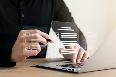 Businessman working with laptop a symbol of top service ISO Certification Document Management System Quality assurance.