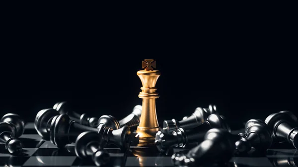 Close-up King standing on a chessboard. There\'s a falling chess in front, leadership. teamwork Business Team Challenges, Global Industry Winners.