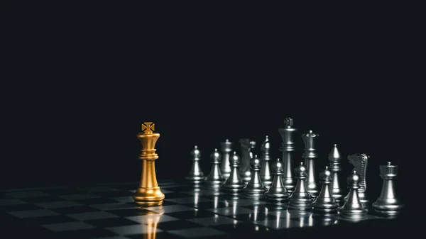 Close-up King standing on a chessboard. There\'s a falling chess in front, leadership. teamwork Business Team Challenges, Global Industry Winners.