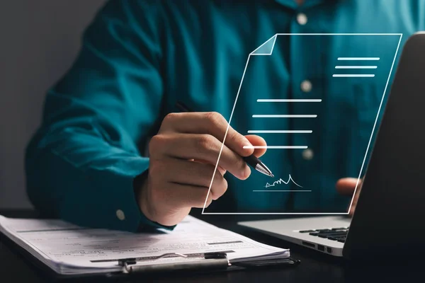 Electronic Signature Concept, Electronic Signing Businessman signs electronic documents on digital documents on virtual laptop screen.