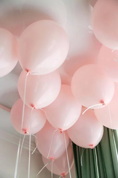pink balloons at the party under the ceiling