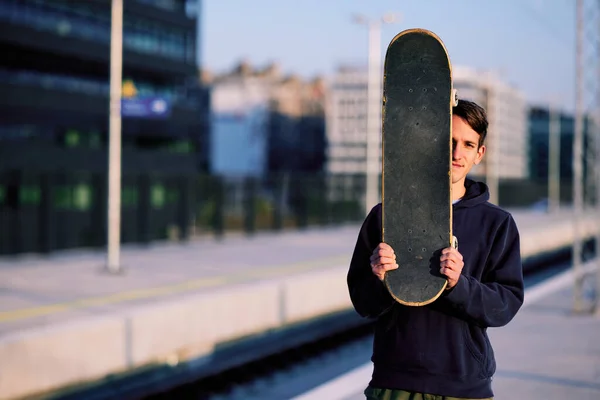 Teenage Skater Posing His Board — Fotografia de Stock