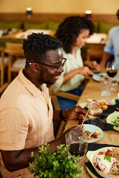 African Man Sits Restaurant Eats Lunch Friends — 스톡 사진