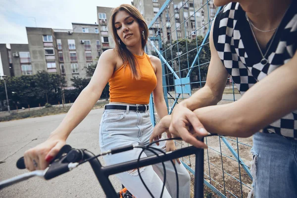 Teenage Girl Sitting Bicycle Playground While Her Boyfriend Leaning Bicycle — 图库照片