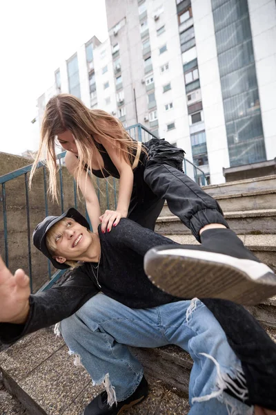 Teenage Couple Having Fun Urban Exterior Acting Silly — Stockfoto