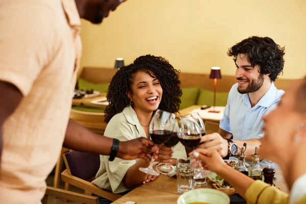 Multicultural Group Friends Toasting Red Wine Restaurant Dinner Table — 스톡 사진