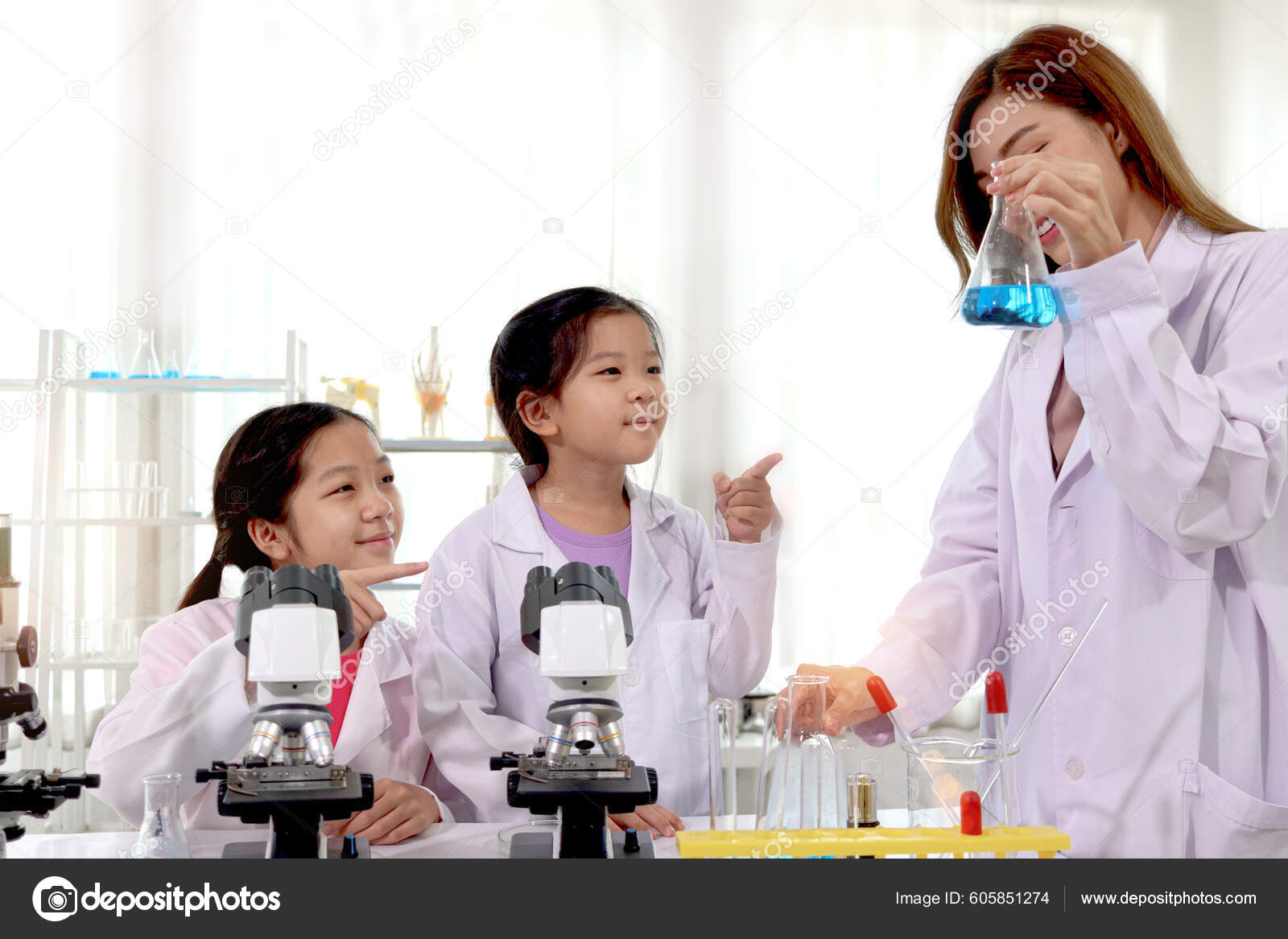 Students Teacher Lab Coat Having Fun Together While Learning