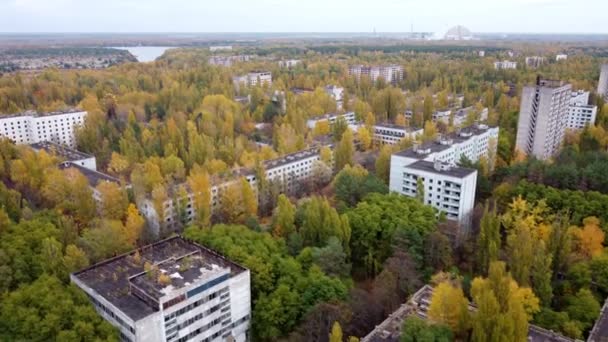 A drone view of the streets of the town of Pripyat near Chernobyl — Stock videók