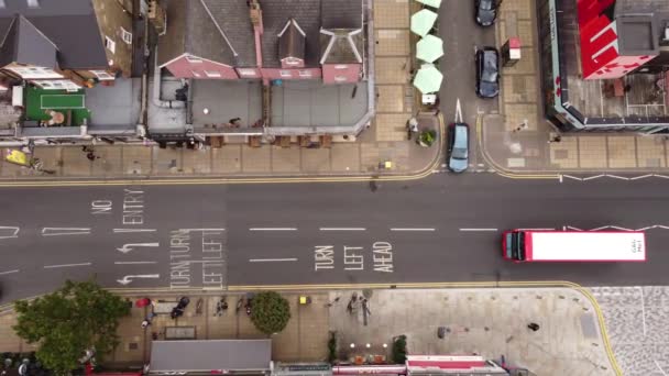 Vista do drone de cima para a rua com um caminhão em movimento. — Vídeo de Stock