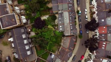 Aerial view of small houses and yards in Balham, London.