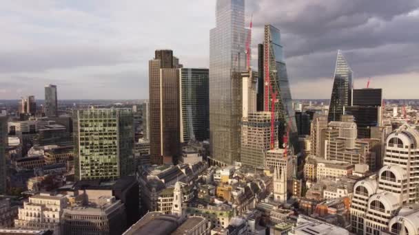 Drone flying around the tallest skyscrapers in London City. — Stockvideo