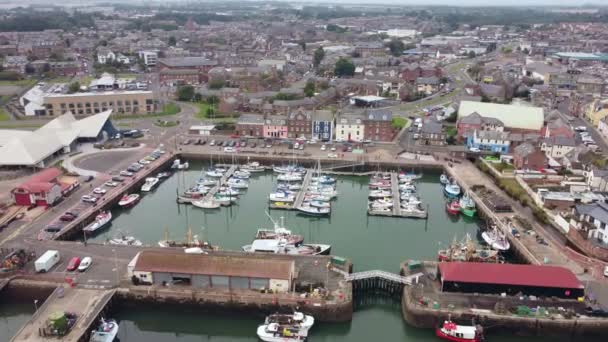 A drone view of the boat dock at the port of Arbroath, Scotland. — Vídeo de stock