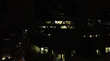 Drone view of the endless lights of Londons skyscrapers in the dead of night. City of London in all its beauty at night