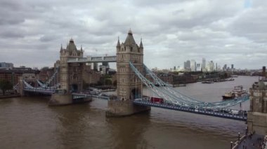 Drone view of Tower Bridge in London in August. Smooth footage.