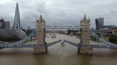 Side view of Tower Bridge during the closing of the road from the Thames. Drone view. London.