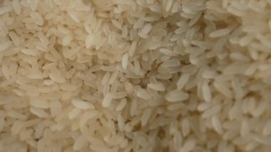 Macro photography of parboiled Chinese rice groats. Beautiful food pattern for the background.