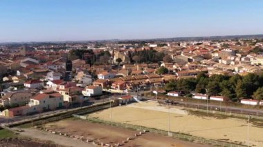 Aerial view of the village of Meze, on a winter morning, in Herault in Occitanie, France