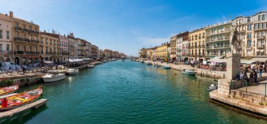 Panoramic view of the Sete canal in the morning in spring, in Herault in Occitanie, France