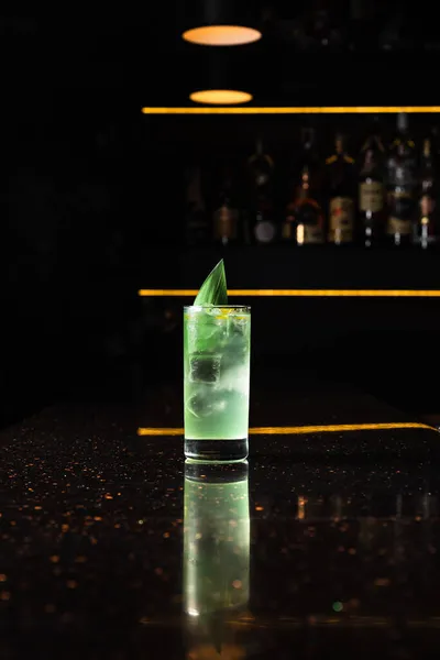 Light Green Alcoholic Cocktail Highball Glass Ice Garnished Bamboo Leaf — Stock Photo, Image